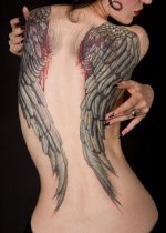 bleeding-angel-wings-woman-with-long-black-nails-back-tattoo-heaven-tattoos-black-background-1.jpg